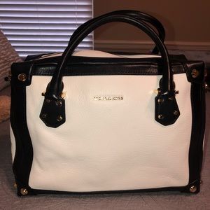 White and black MK purse